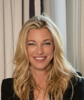 Nicole Junkermann smiling, a warm close-up portrait