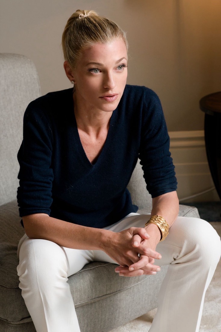 Nicole Junkermann seated in an armchair, relaxed and in conversation
